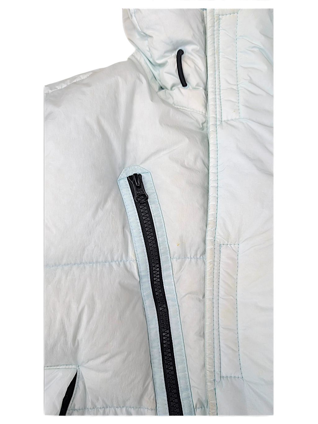 Quilted pale blue Stone Island down coat fabric and zipped pocket detail