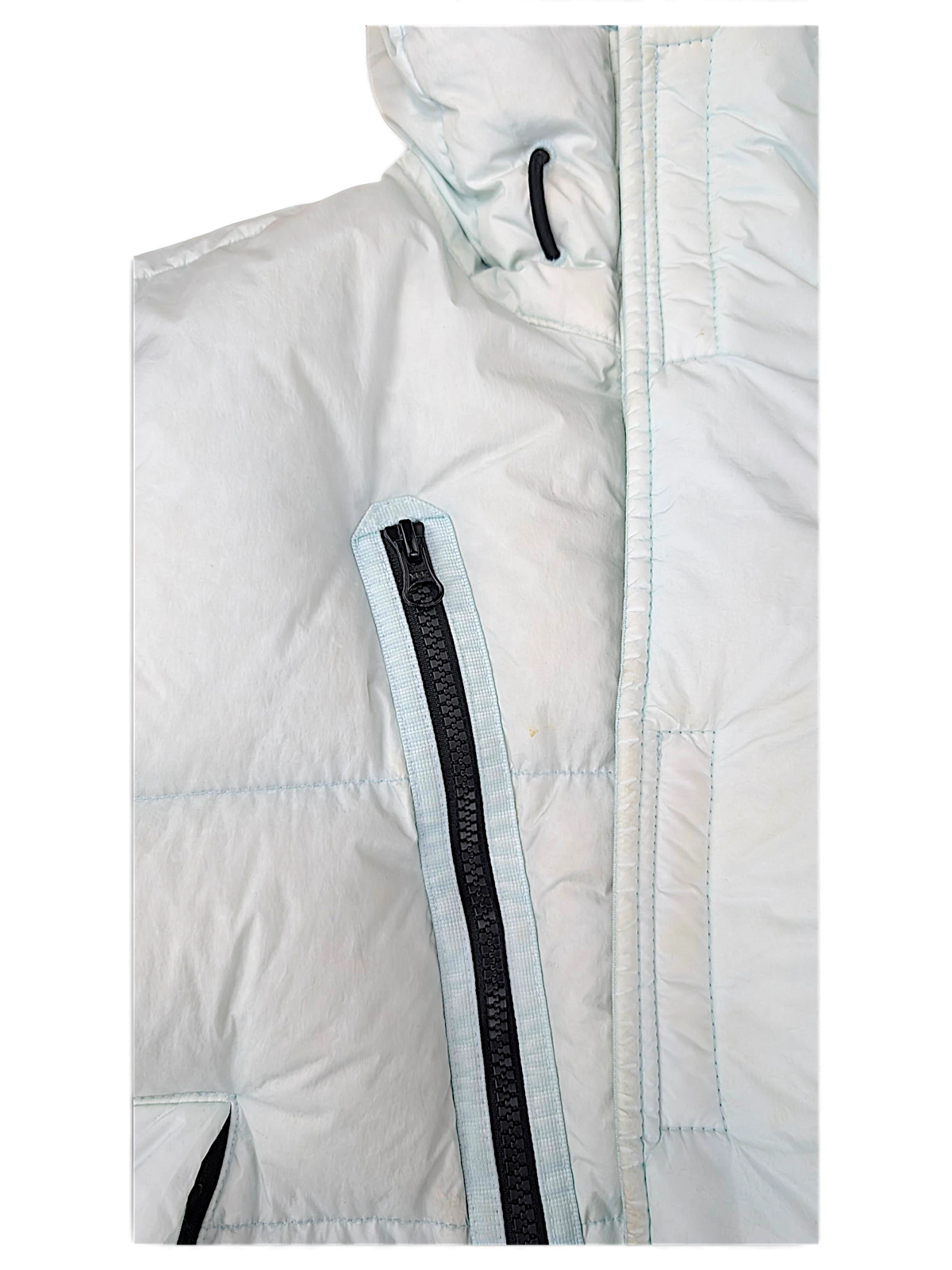 Quilted pale blue Stone Island down coat fabric and zipped pocket detail