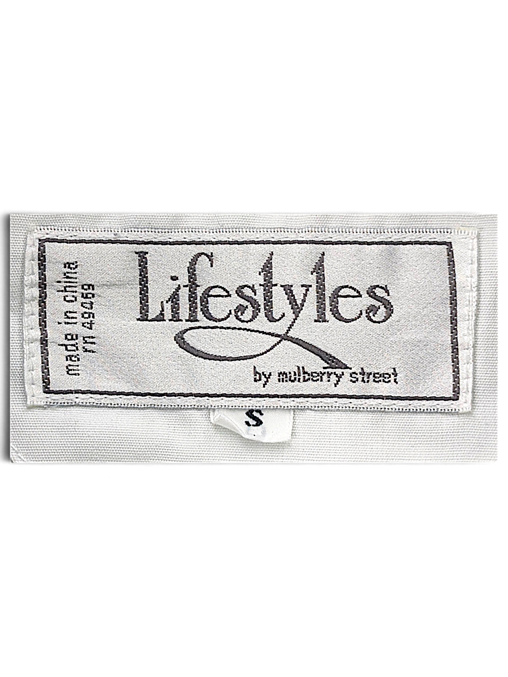 Lifestyles White Geometric Windbreaker – S; detail view showing fabric, construction, label or condition (image 3 of 5).