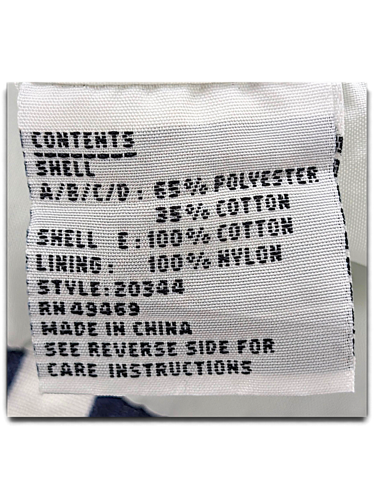Lifestyles White Geometric Windbreaker – S; detail view showing fabric, construction, label or condition (image 4 of 5).