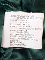 JAKE & IPI Jeff Hamilton varsity jacket material and care label showing genuine leather, wool, and polyester blend