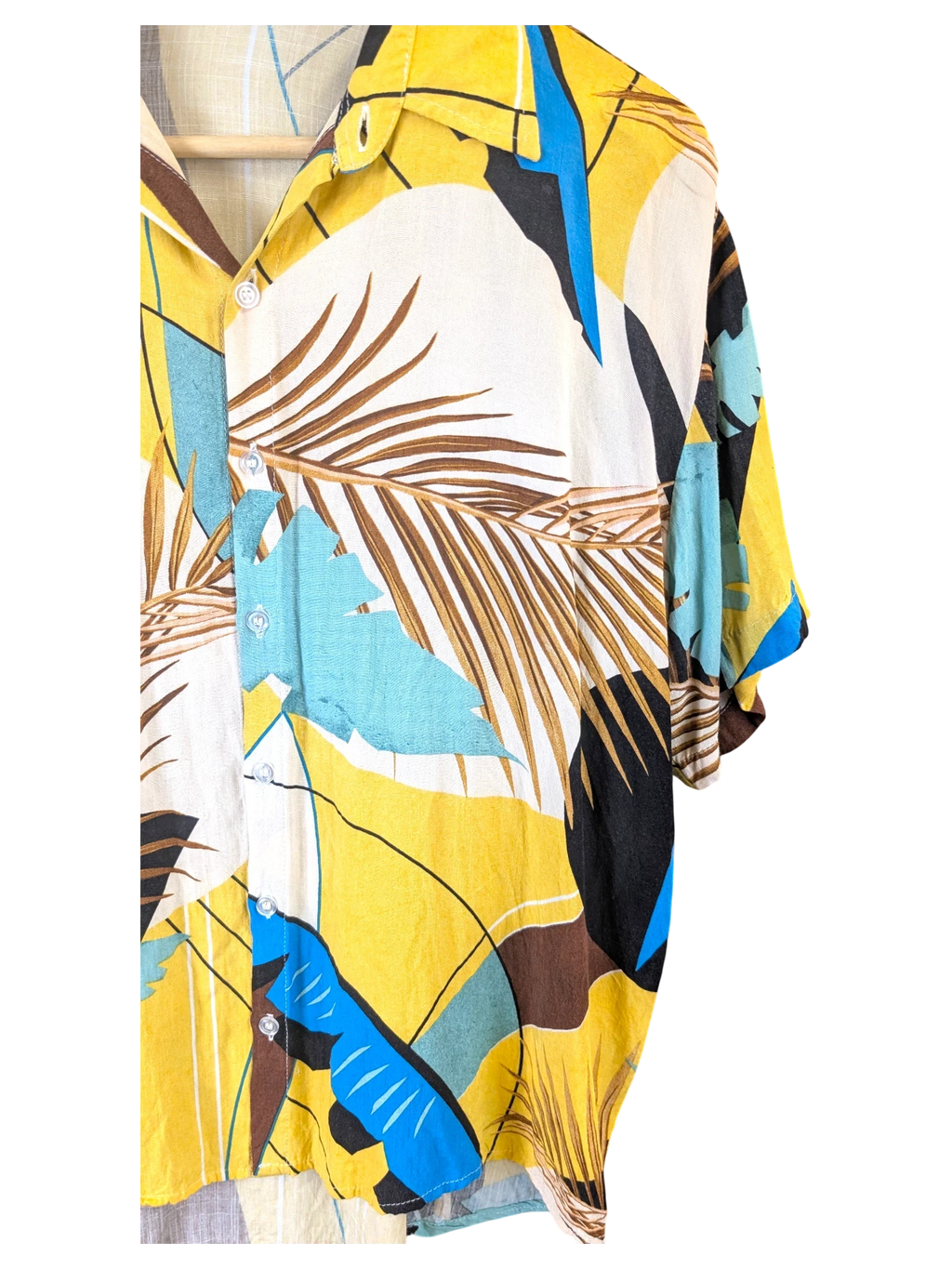 JAKE & IPI Veran Hawaiian shirt featuring a yellow, blue, and brown tropical palm leaf print on a lightweight fabric