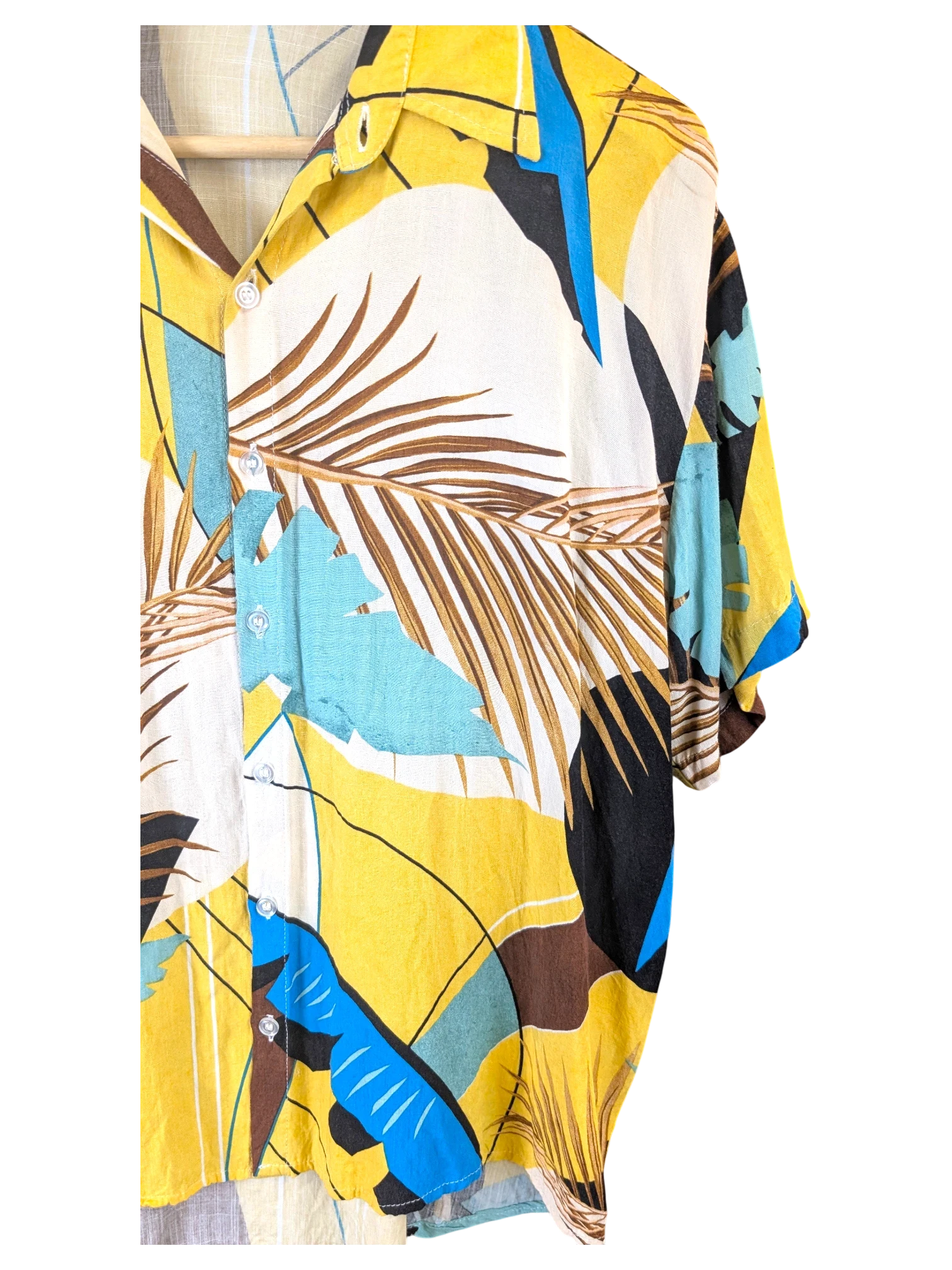 JAKE & IPI Veran Hawaiian shirt featuring a yellow, blue, and brown tropical palm leaf print on a lightweight fabric