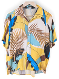 JAKE & IPI Veran Hawaiian shirt featuring a vibrant yellow, blue, and brown tropical palm leaf print on a hanger.