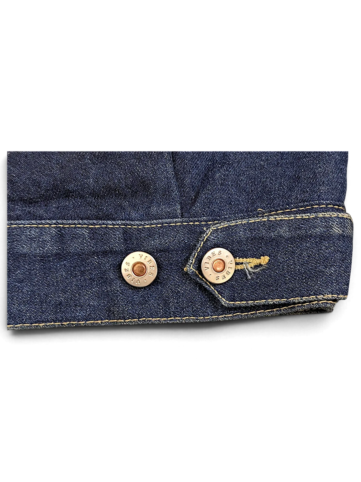 JAKE & IPI Vibes dark blue denim vest featuring metallic buttons with embossed branding and contrast stitching.