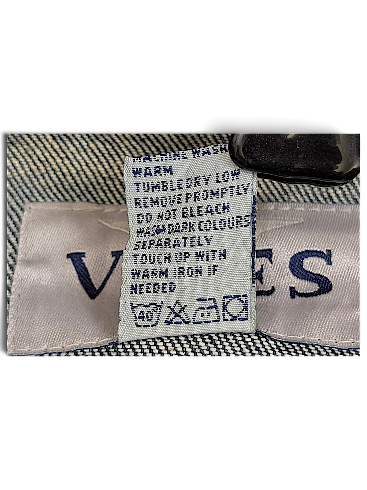 JAKE & IPI Vibes denim vest interior label with care instructions and brand logo