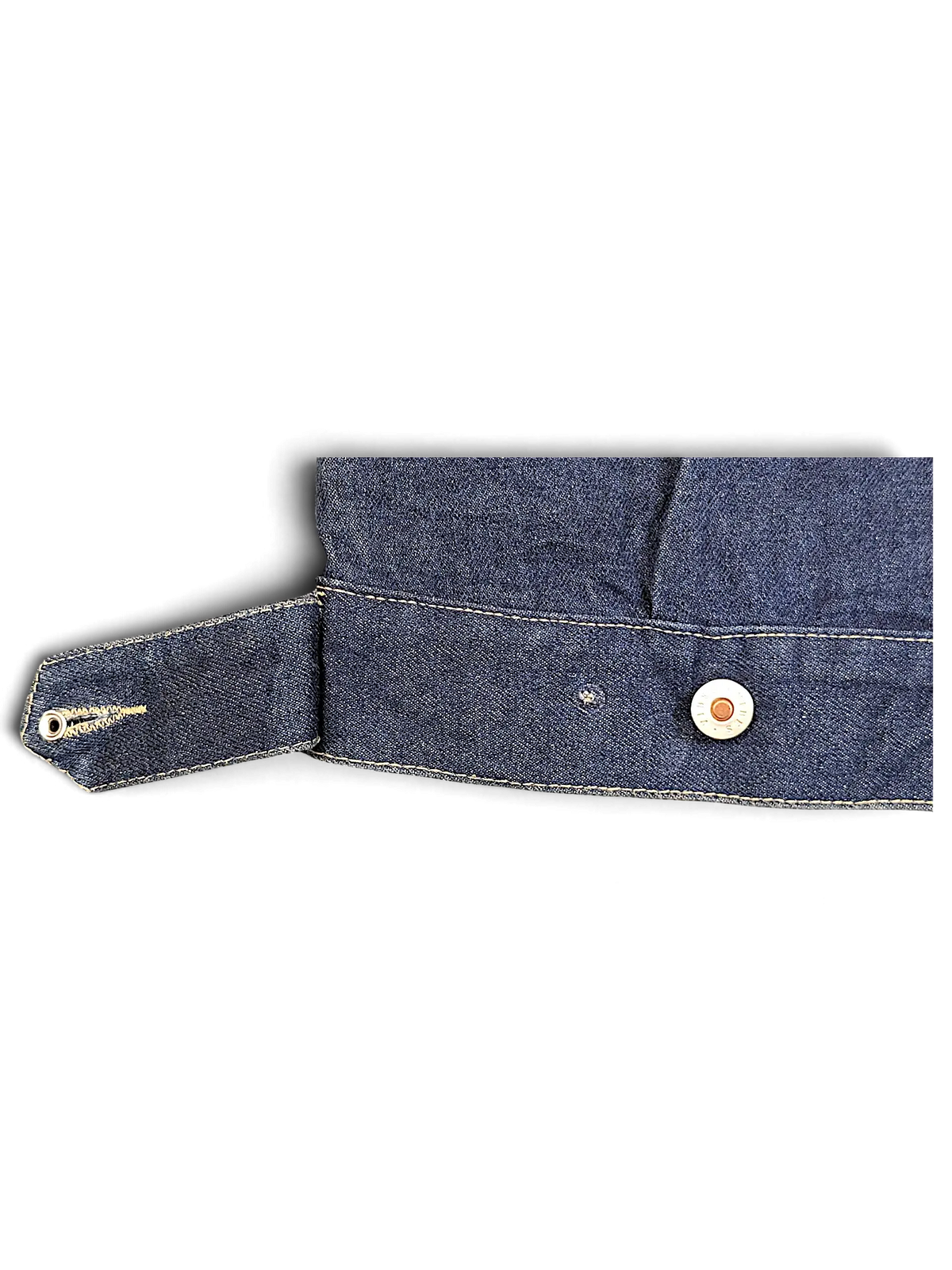 JAKE & IPI Vibes denim vest featuring a dark blue wash, contrast stitching, and a button-tab waist detail.