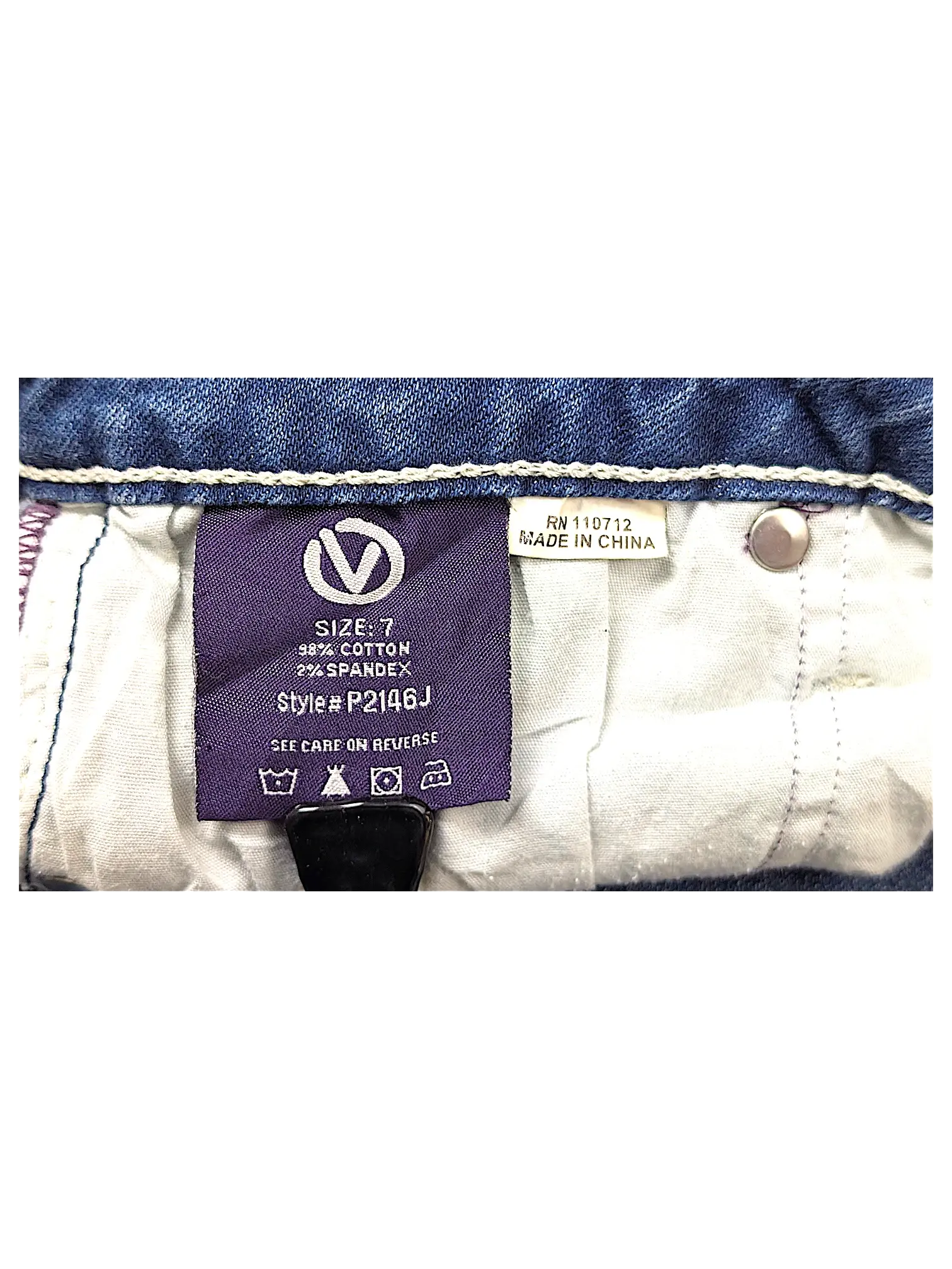 JAKE & IPI Vigoss flare jeans size 7 label showing cotton and spandex material composition