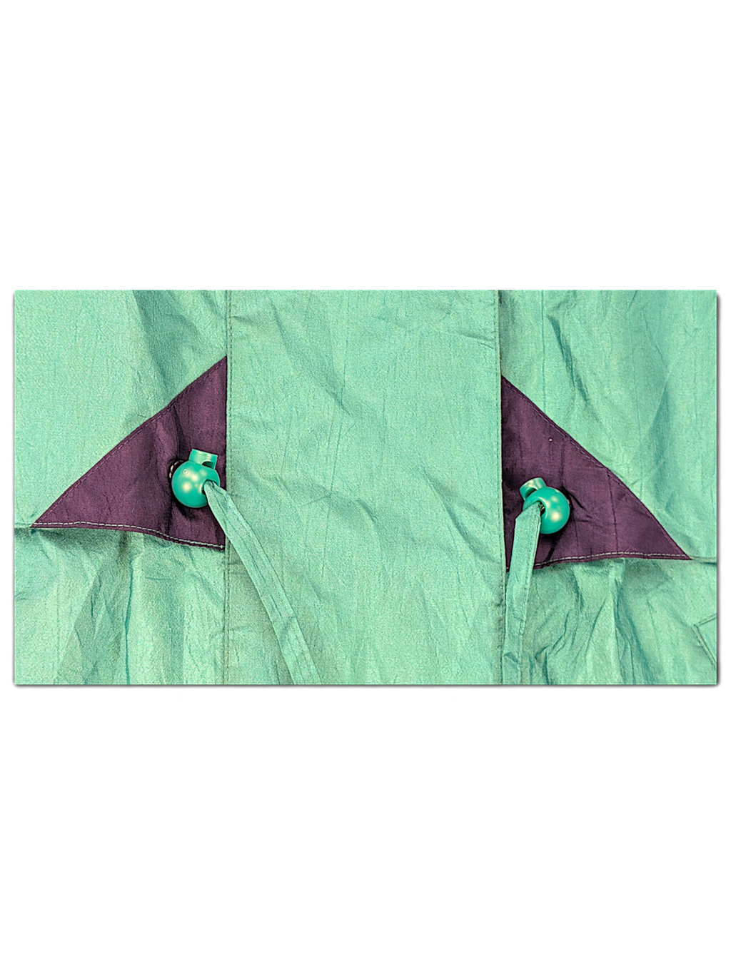Cabin Creek Petite Green Drawcord Jacket; Green fabric, purple trim and drawcord detail.