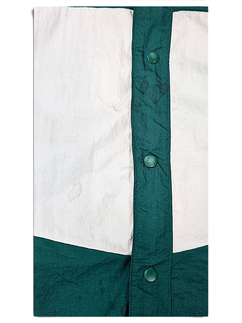 Edgar + Ash Green Colourblock Coach Jacket; Front panel and green snap detail.