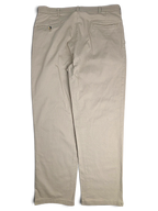 JAKE & IPI vintage beige pleated trousers in stretch cotton with a relaxed straight leg fit and back pockets.