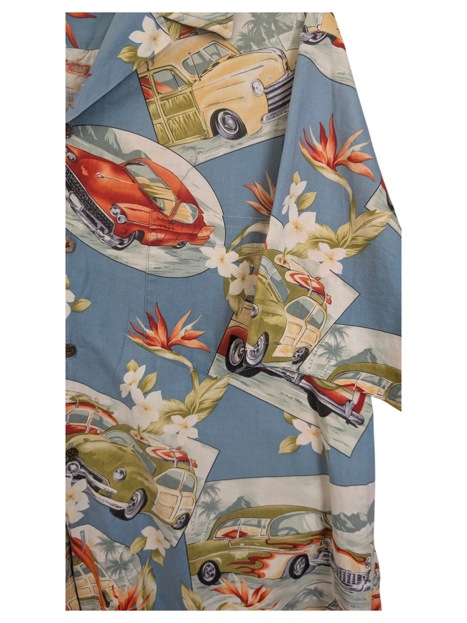 JAKE & IPI vintage blue Hawaiian shirt featuring classic cars, surfboards, and tropical flowers in a 90s style print.