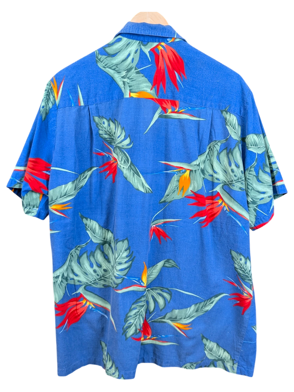 JAKE & IPI vintage 90s blue Hawaiian shirt featuring a vibrant bird of paradise and tropical leaf floral print.