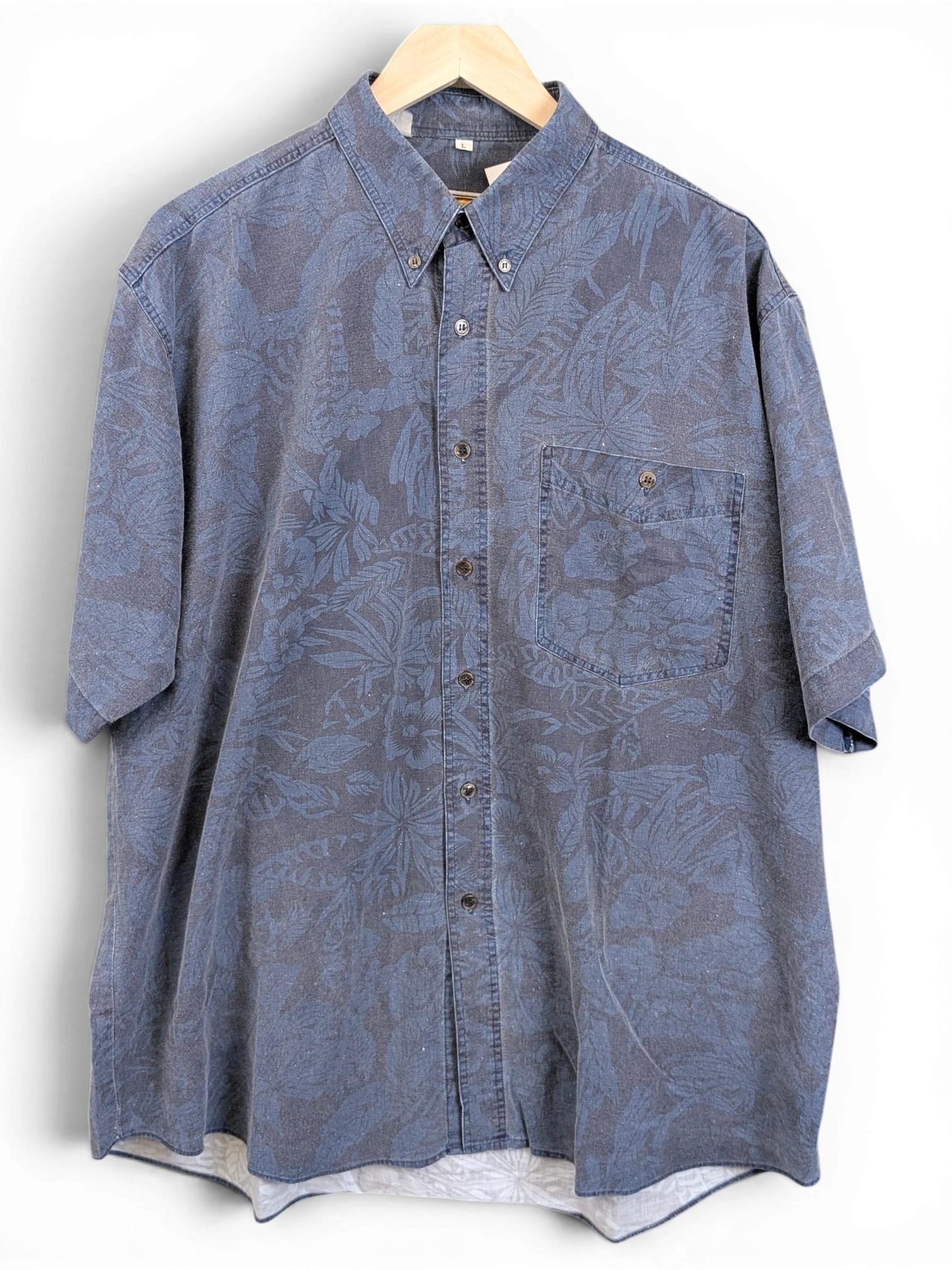 JAKE & IPI vintage 90s blue Hawaiian shirt with a subtle tonal leaf print, button-down collar, and chest pocket.
