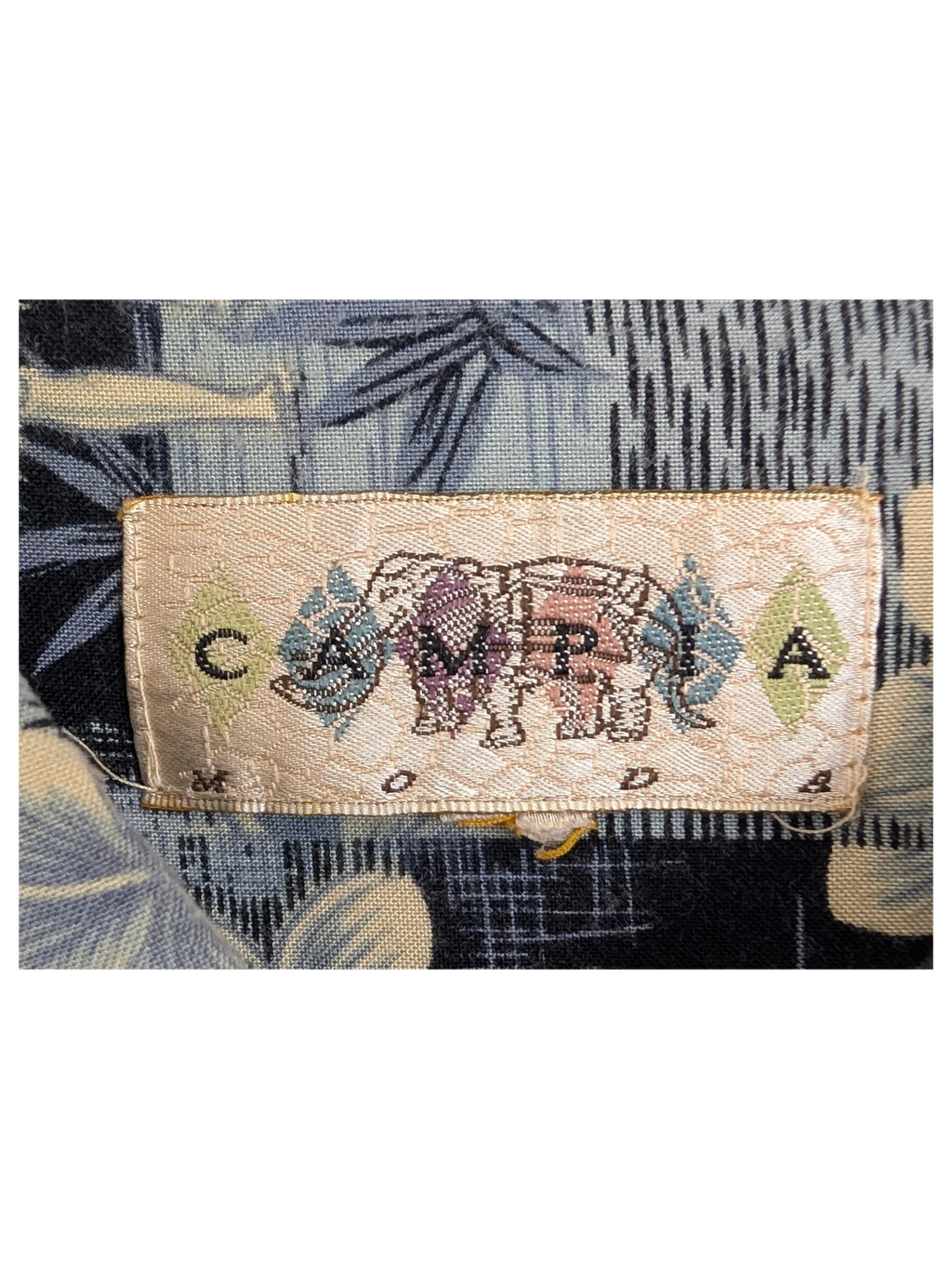 JAKE & IPI vintage Campia Hawaiian shirt label with blue floral print and 100% rayon fabric tag