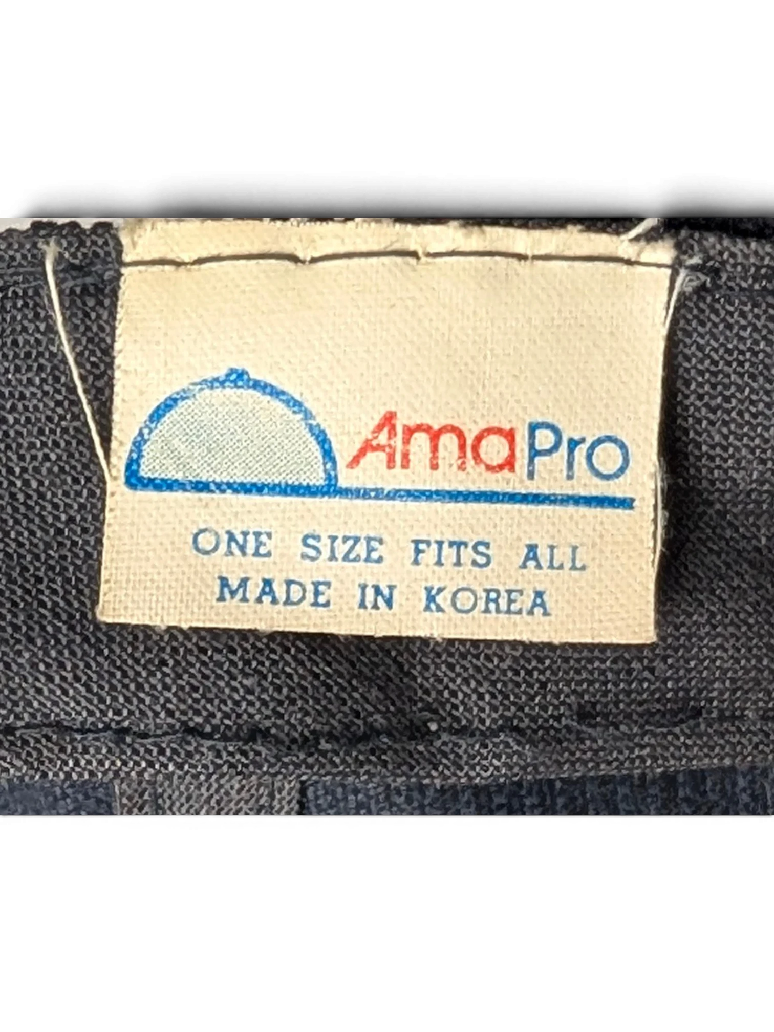 JAKE & IPI vintage corduroy baseball cap interior label featuring AmaPro branding and Made in Korea text