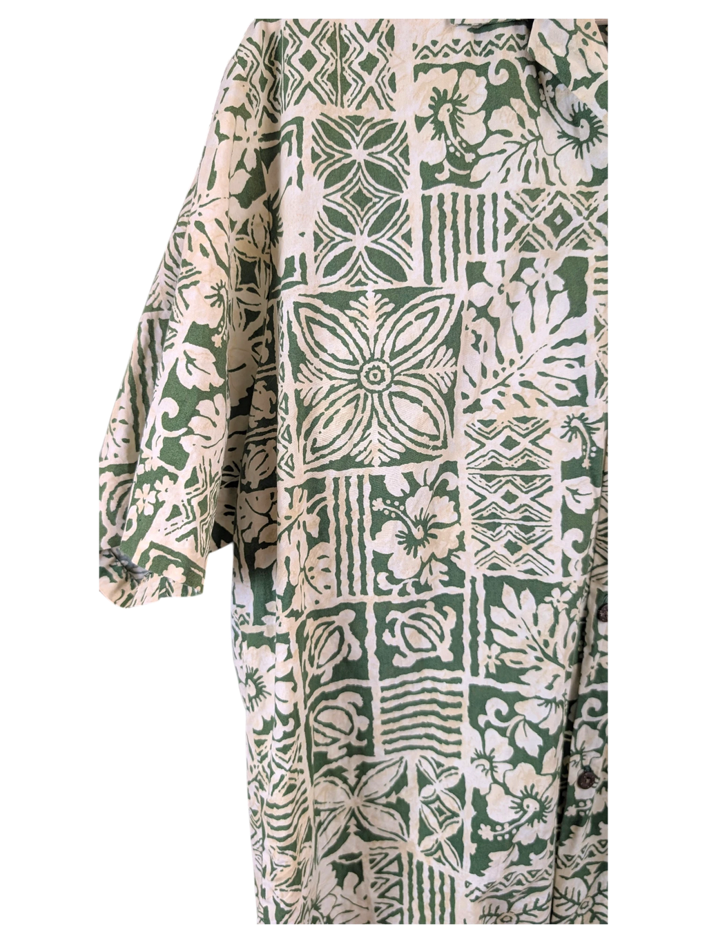 JAKE & IPI vintage 90s Hawaiian shirt featuring a green and cream geometric and floral tapa print pattern.