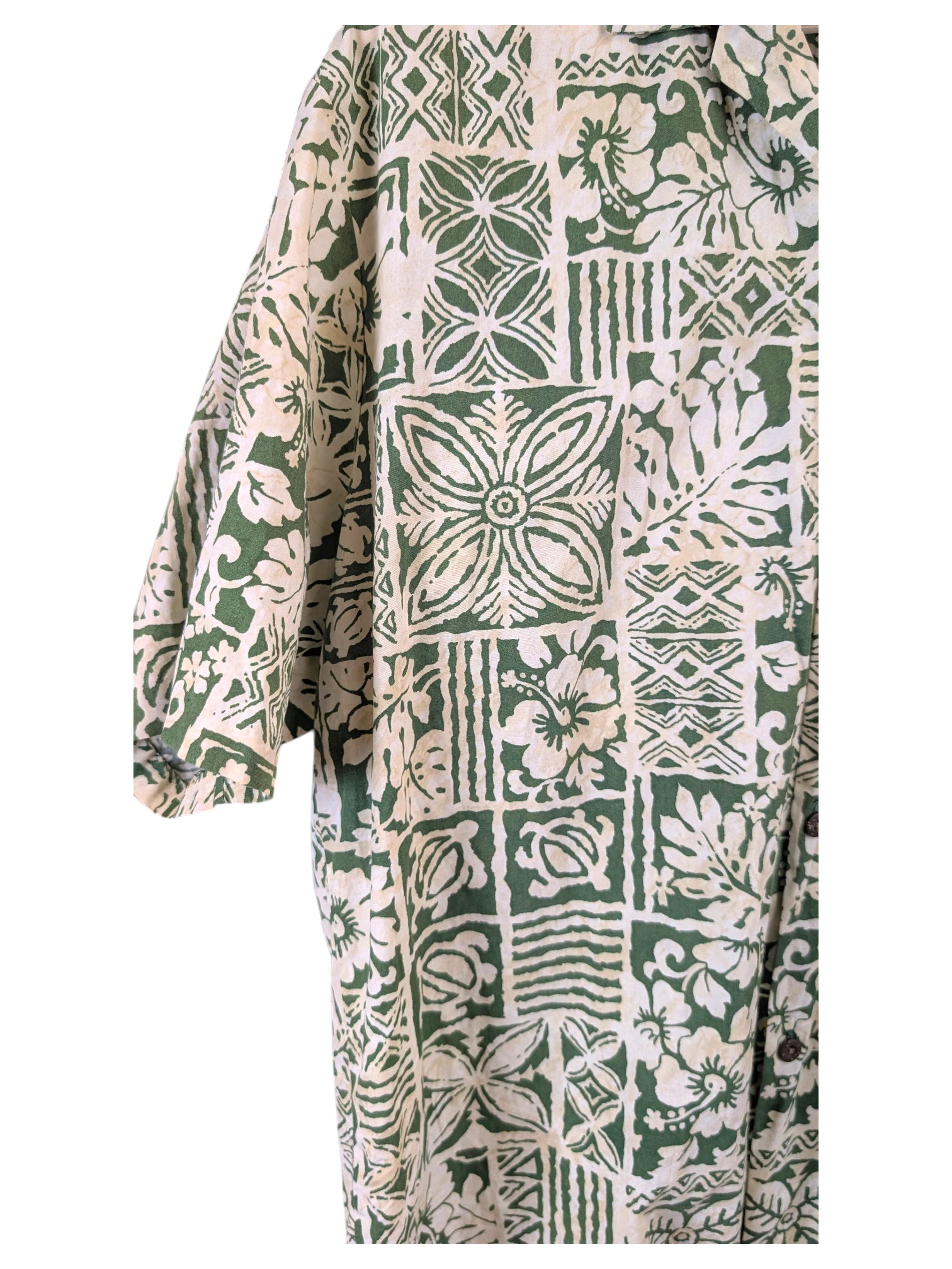 JAKE & IPI vintage 90s Hawaiian shirt featuring a green and cream geometric and floral tapa print pattern.