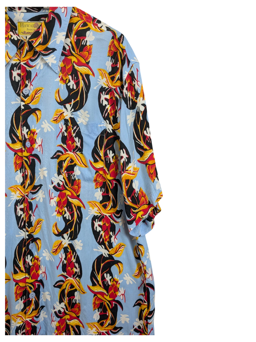 JAKE & IPI vintage 90s Hawaiian shirt in light blue with bold red, yellow, and black tropical floral print