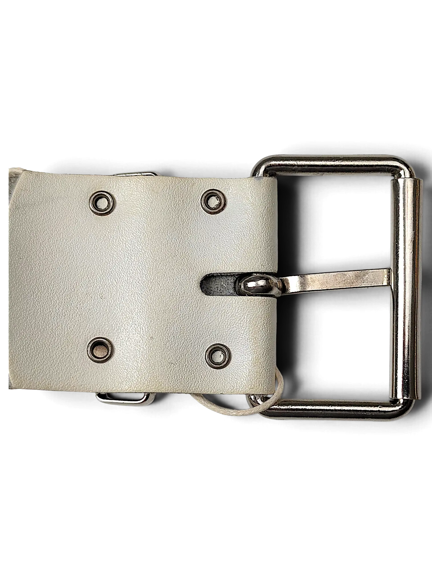 JAKE & IPI white leather belt featuring a silver-tone metal buckle and industrial grommet detailing in a Y2K style.