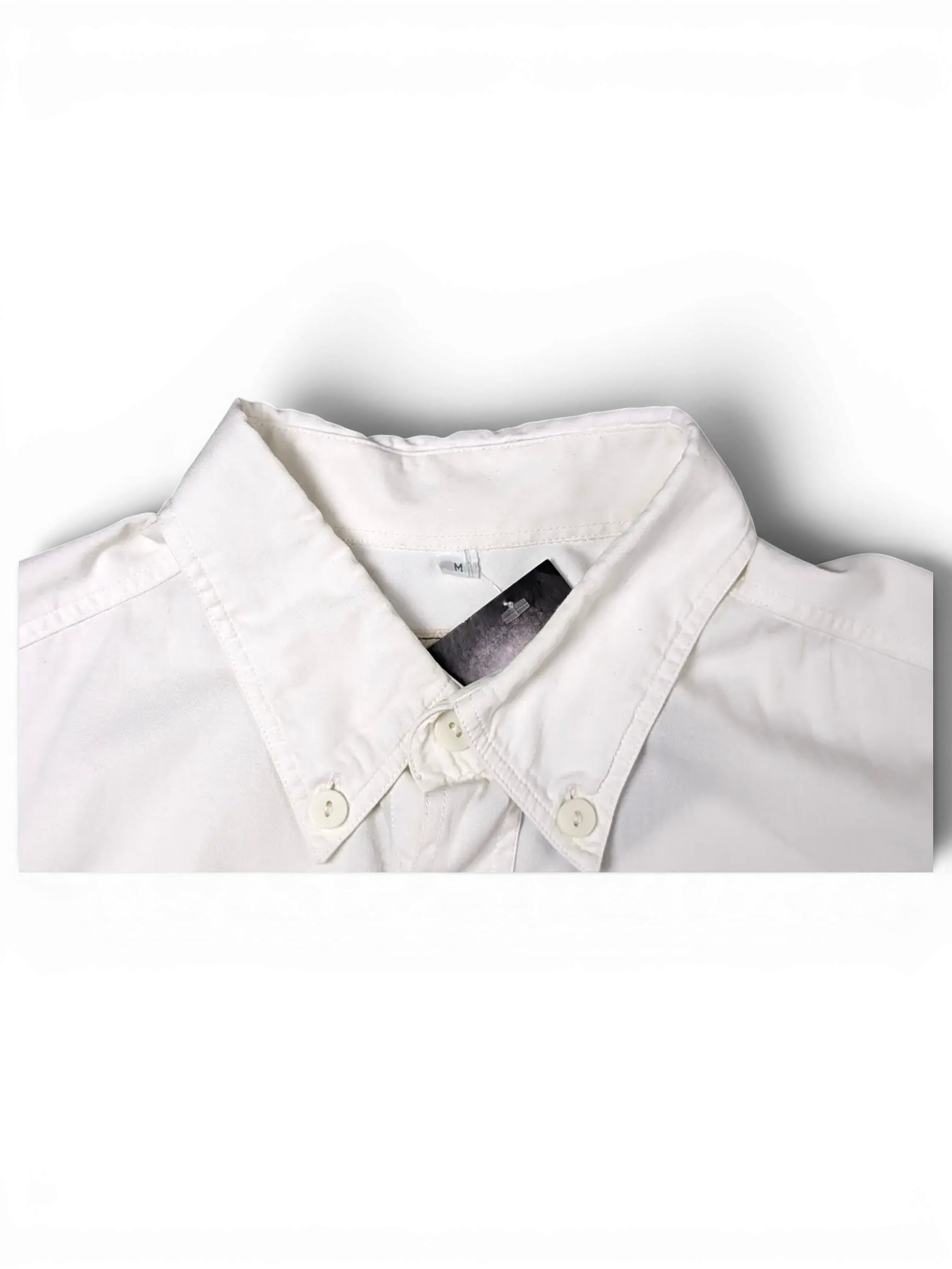 JAKE & IPI white short sleeve utility shirt with a button-down collar and visible size M tag.