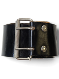 JAKE & IPI wide black leather belt featuring a sturdy silver-toned double-prong metal buckle and rivet details.