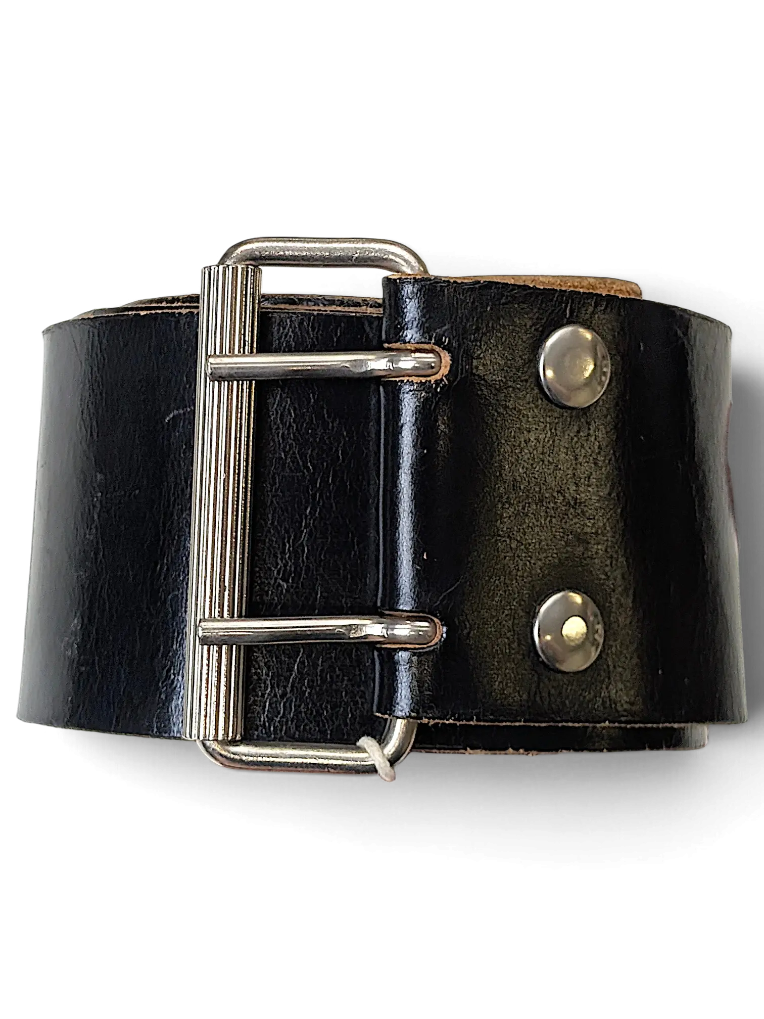 JAKE & IPI wide black leather belt featuring a sturdy silver-toned double-prong metal buckle and rivet details.