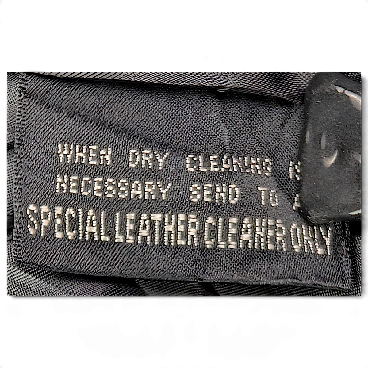 Wilsons Leather Black Thinsulate Belted Leather Coat – XS – care label close-up.