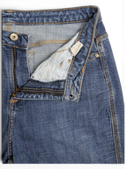 JAKE & IPI pre-owned Wrangler Aura mid blue bootcut jeans featuring a zip fly and contrast stitching detail