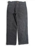 JAKE & IPI Wrangler A203 black denim jeans with a straight leg fit and classic five-pocket styling.