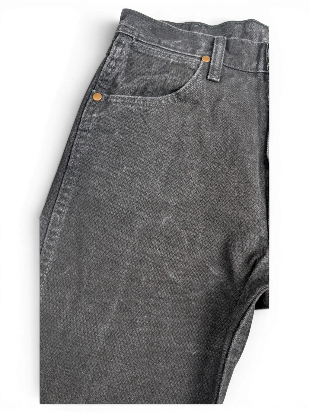 JAKE & IPI Wrangler A203 black denim jeans featuring a classic five-pocket design with copper rivets.
