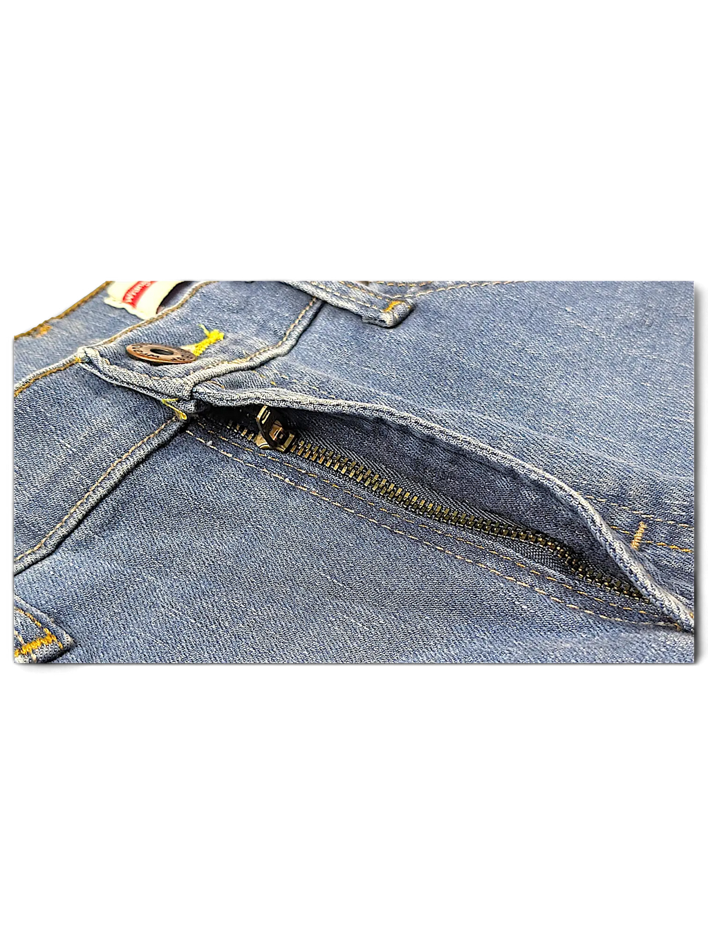 Close-up of JAKE & IPI Wrangler straight fit blue denim jeans featuring a metal zipper fly and contrast stitching.