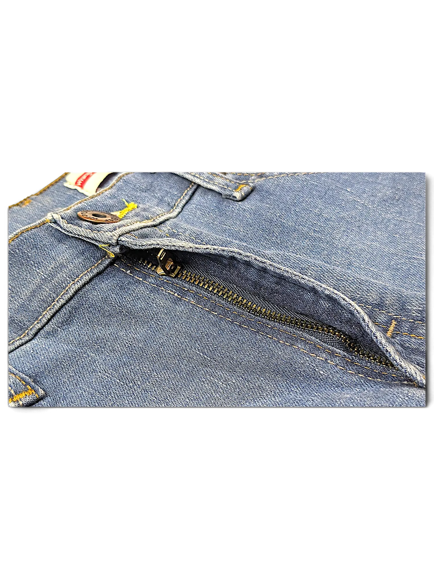 Close-up of JAKE & IPI Wrangler straight fit blue denim jeans featuring a metal zipper fly and contrast stitching.