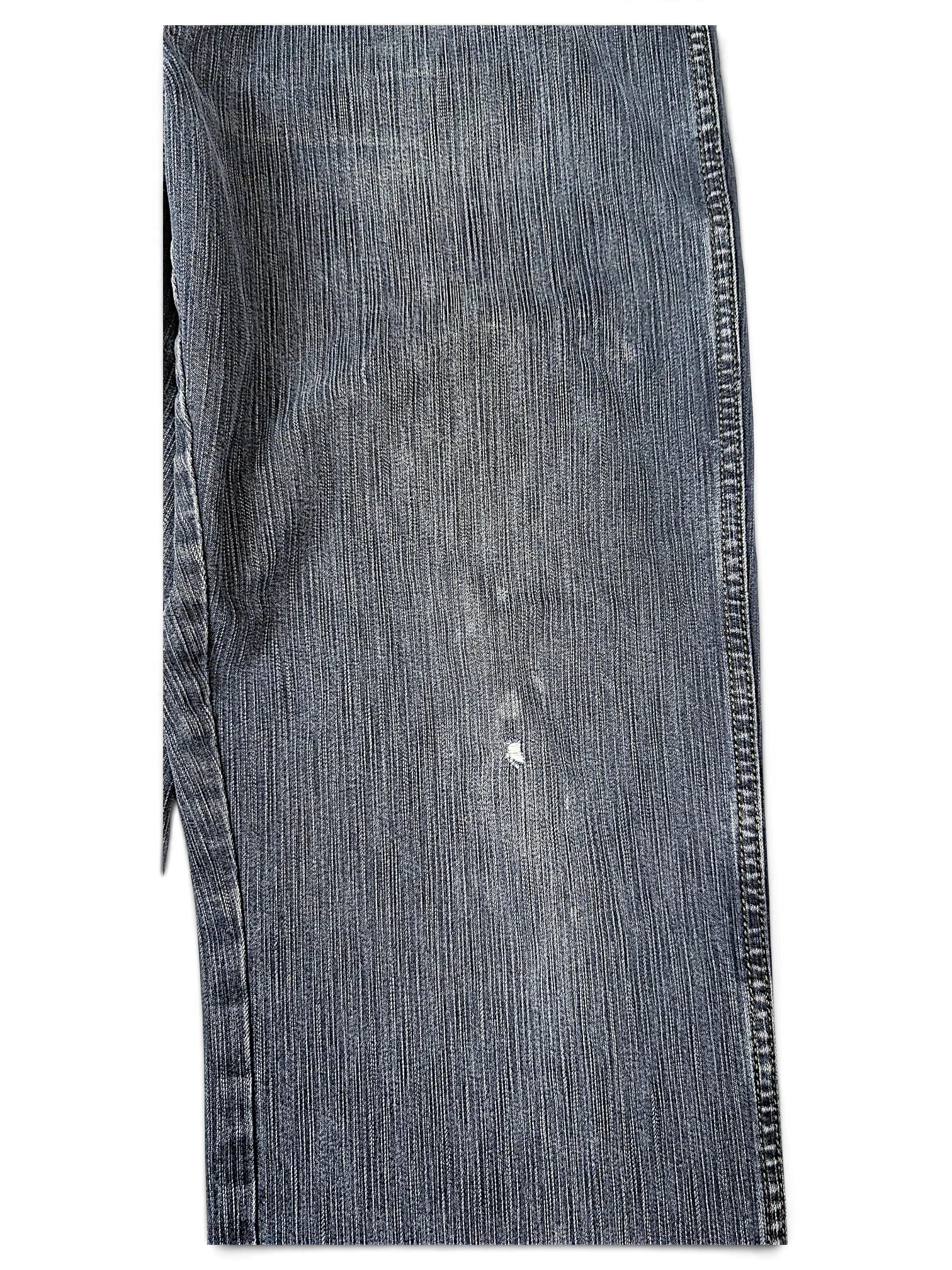 JAKE & IPI Wrangler blue denim jeans featuring a classic five-pocket design and subtle distressed wear detail.