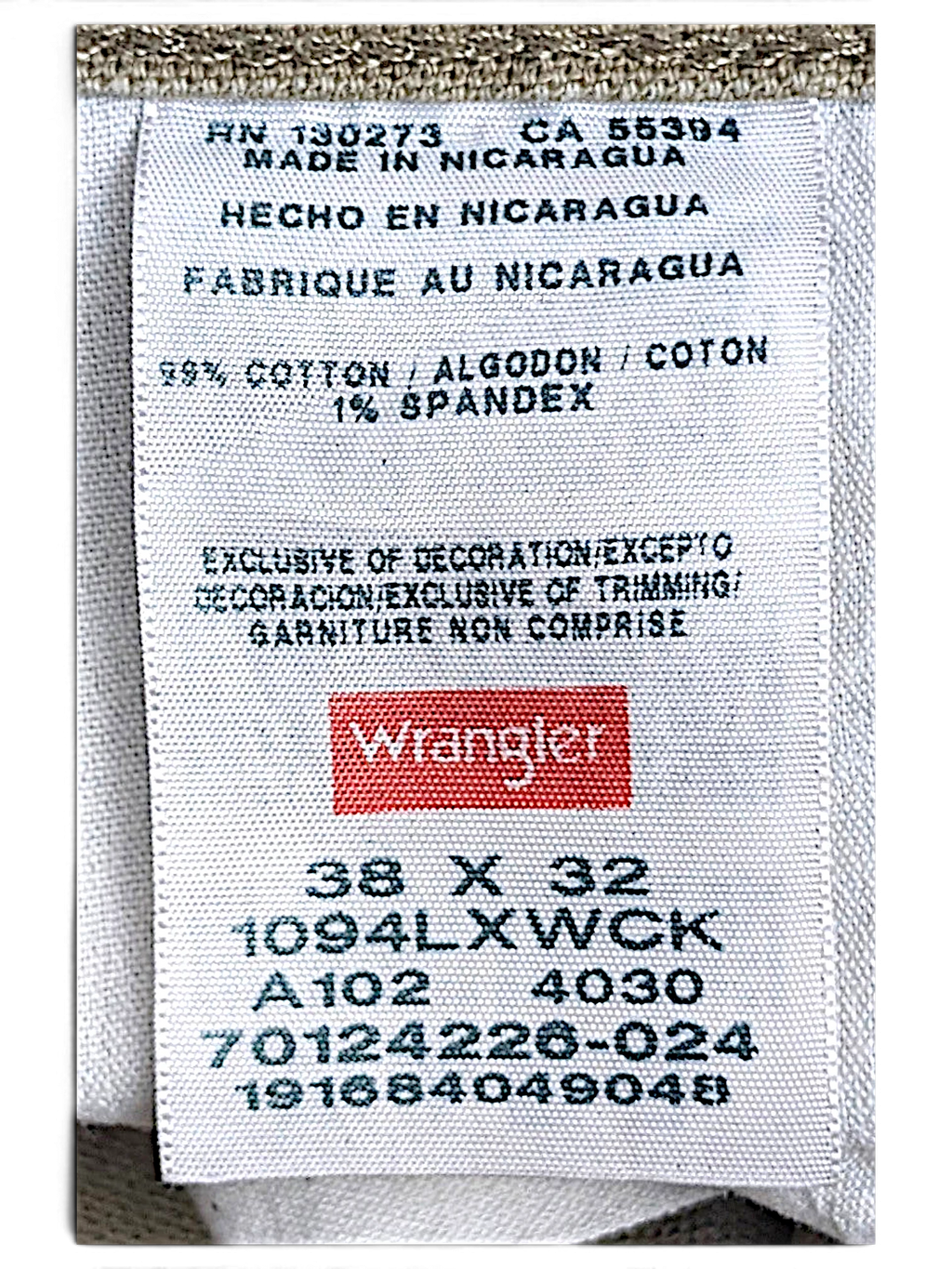 JAKE & IPI Wrangler khaki carpenter pants care label showing cotton spandex composition and size 38x32