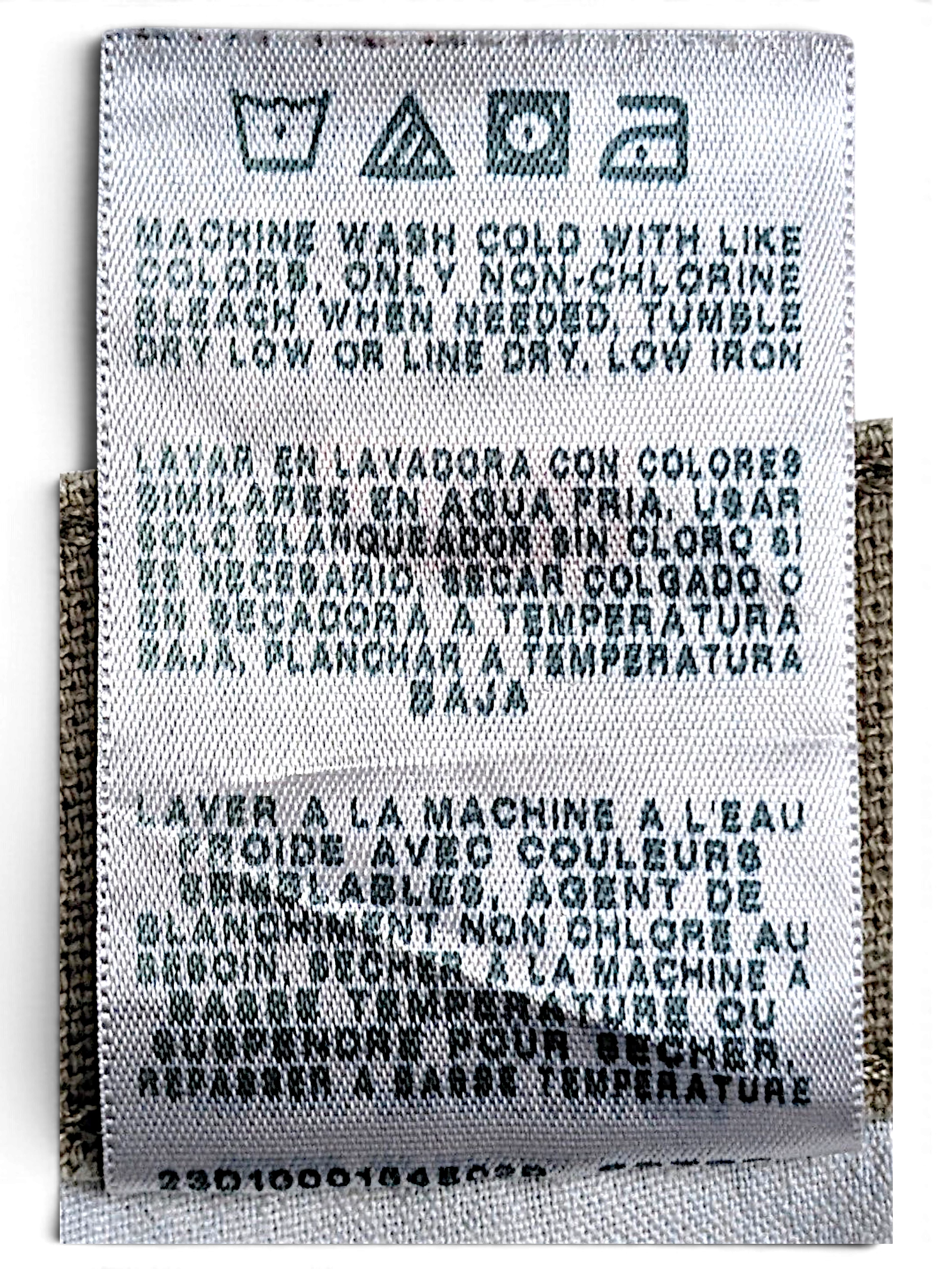 JAKE & IPI Wrangler carpenter pants care label with washing instructions in English, Spanish, and French.