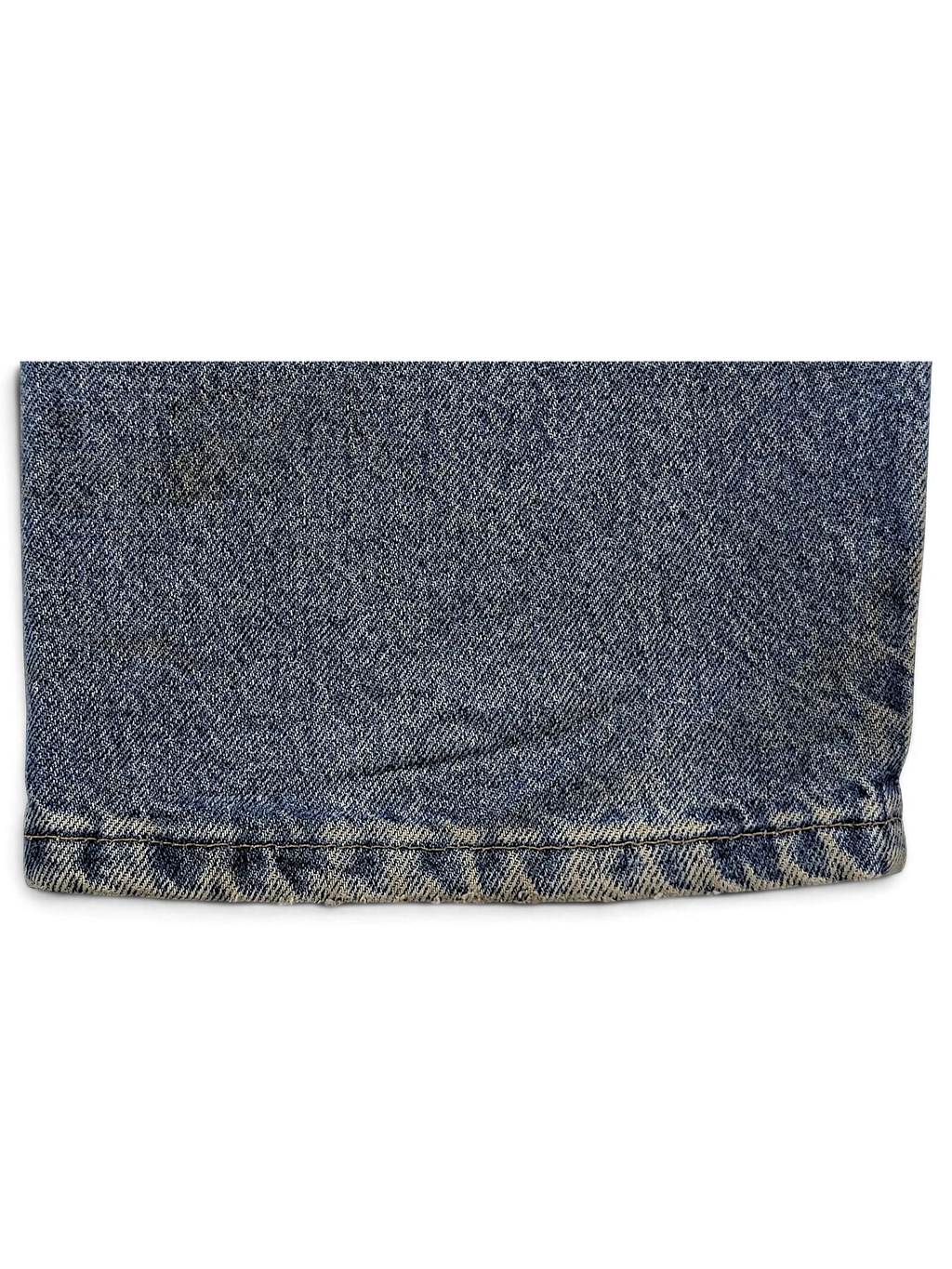 Close-up of the hem of JAKE & IPI Wrangler 96501DS blue denim jeans showing worn texture and stitching detail.