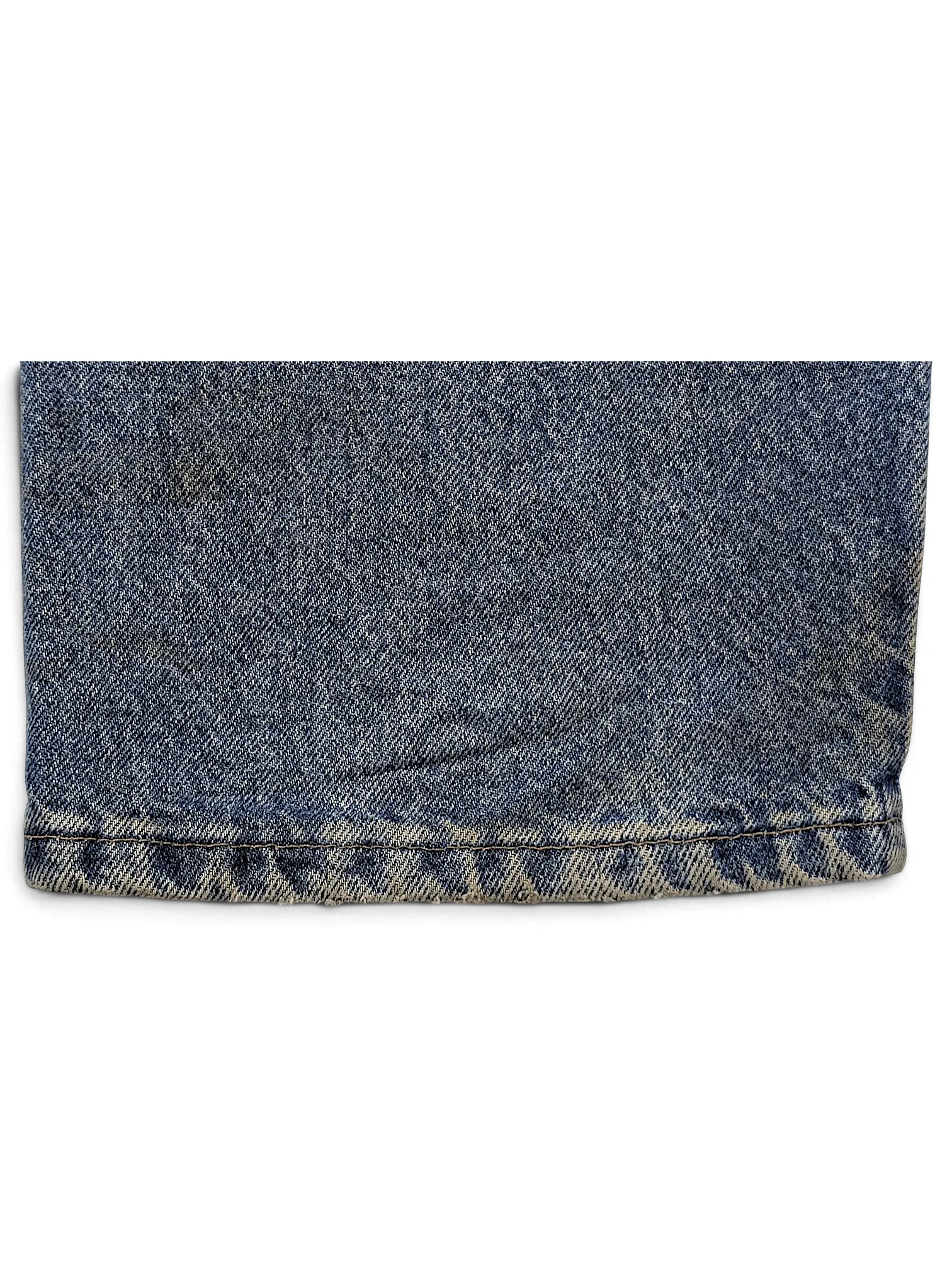Close-up of the hem of JAKE & IPI Wrangler 96501DS blue denim jeans showing worn texture and stitching detail.