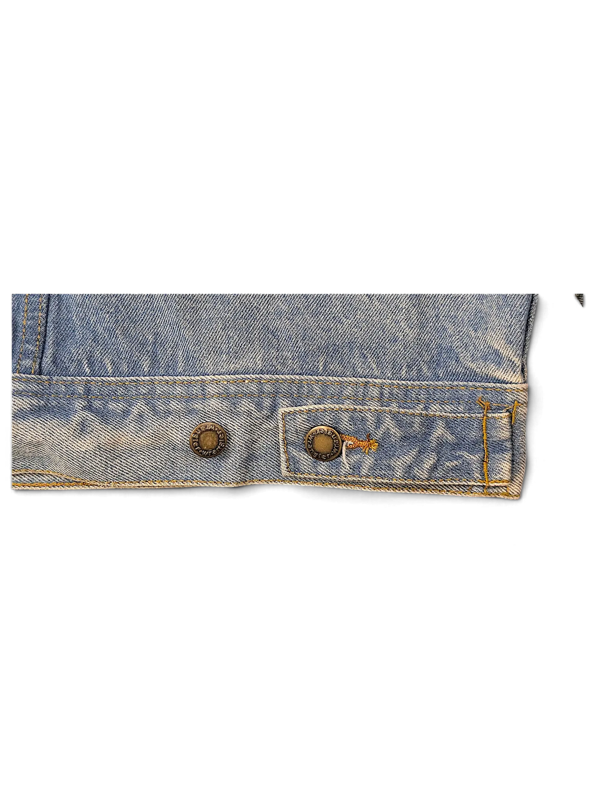 JAKE & IPI Wrangler WMJO1VI light wash denim jacket hem detail with branded metal buttons and contrast stitching