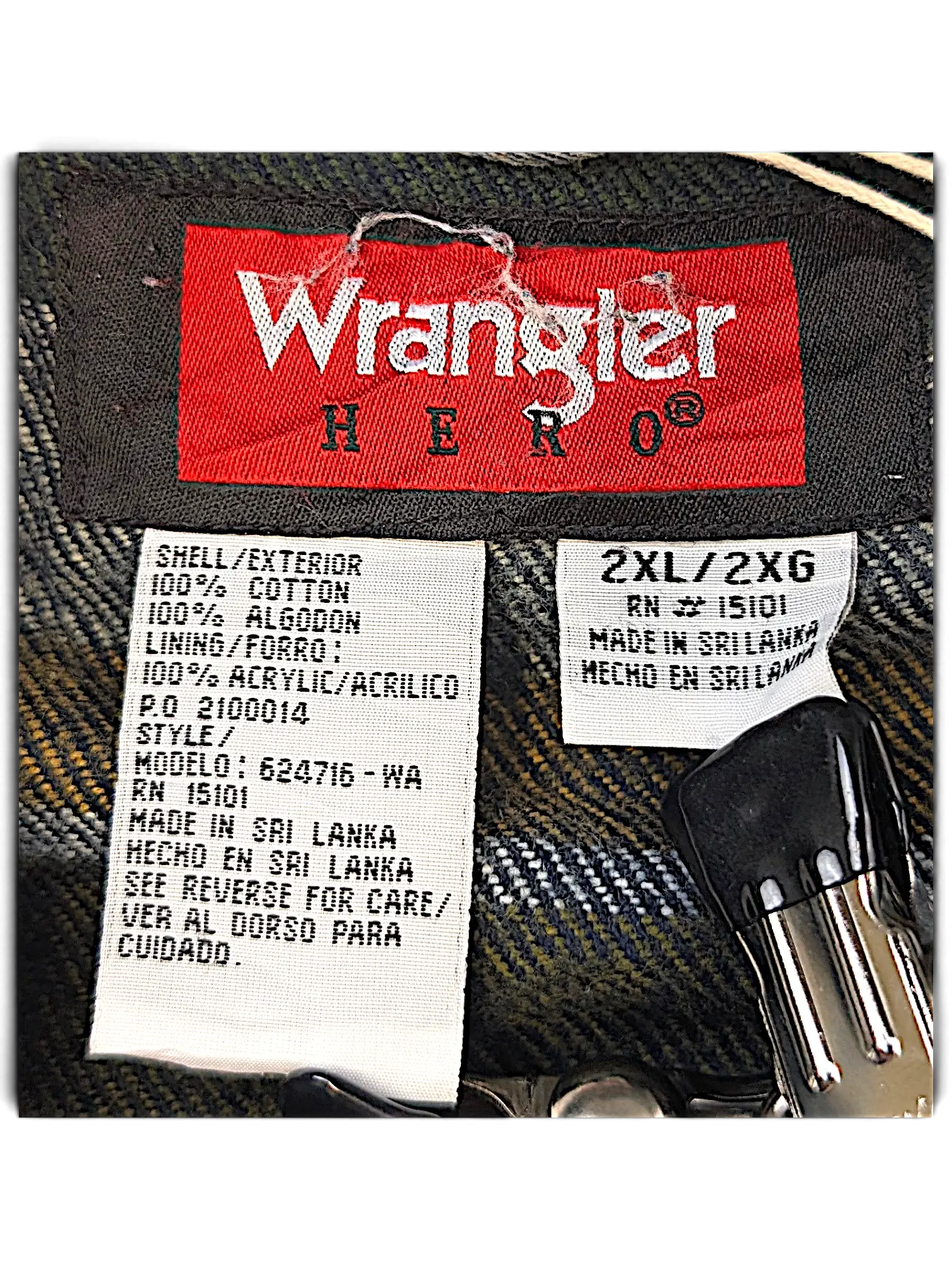 JAKE & IPI Wrangler Hero denim jacket interior label showing size 2XL, cotton shell, and acrylic quilt lining