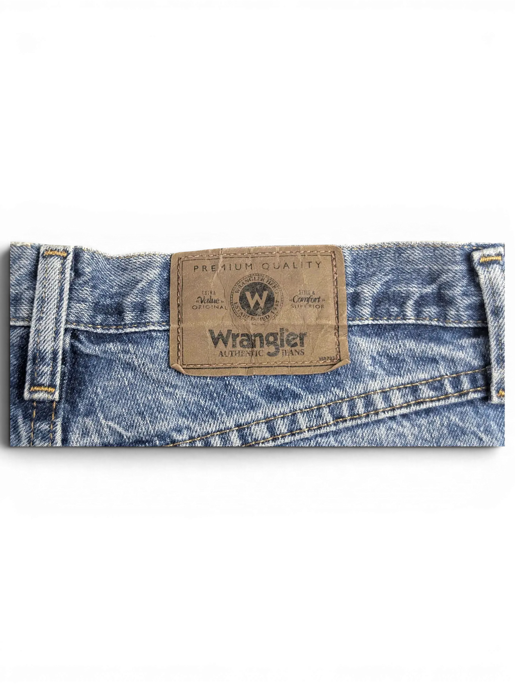 JAKE & IPI Wrangler blue denim jeans featuring a brown leather brand patch on the back waistband