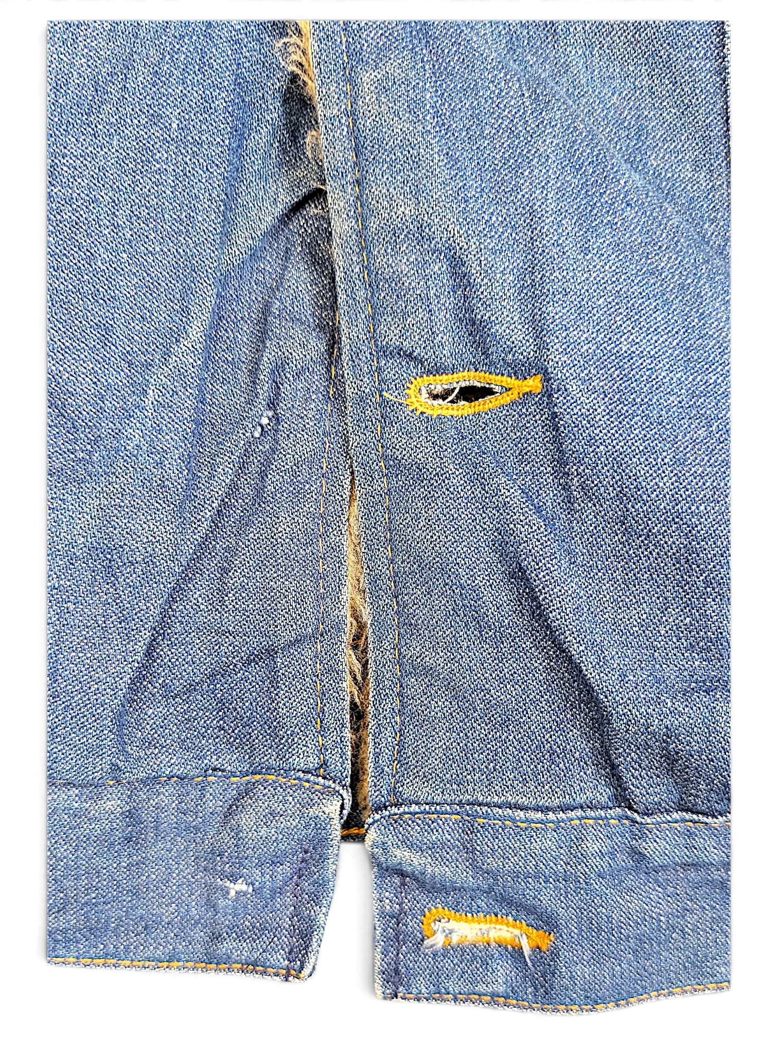 Close-up of JAKE & IPI vintage Wrangler denim sherpa jacket showing blue denim texture and buttonhole detail
