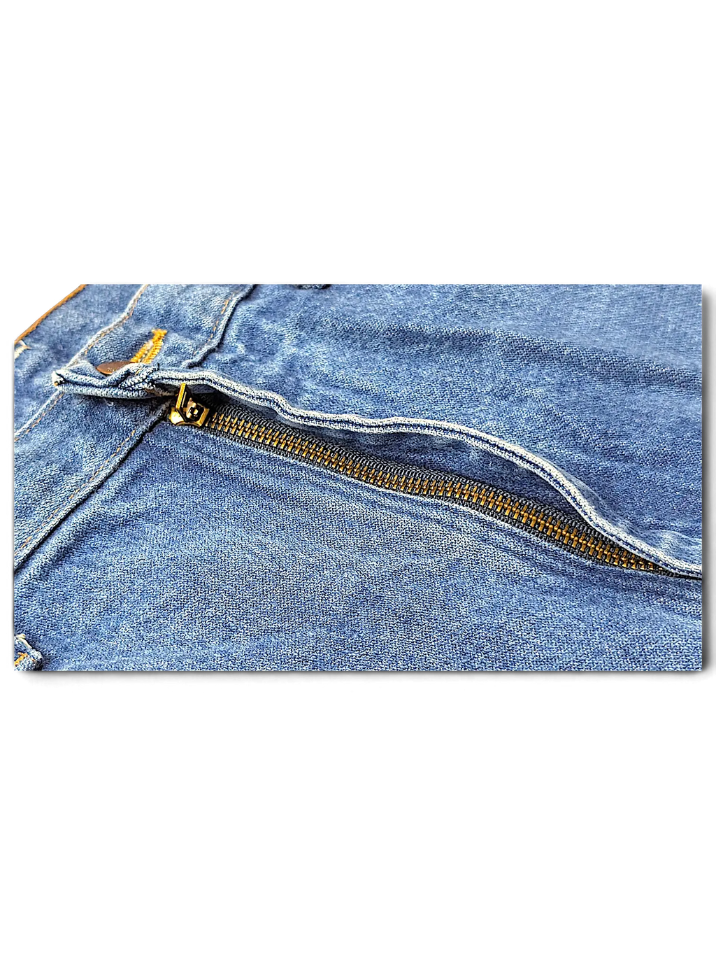 JAKE & IPI Wrangler 936DEN blue denim jeans featuring a brass metal zipper fly and classic stitching detail