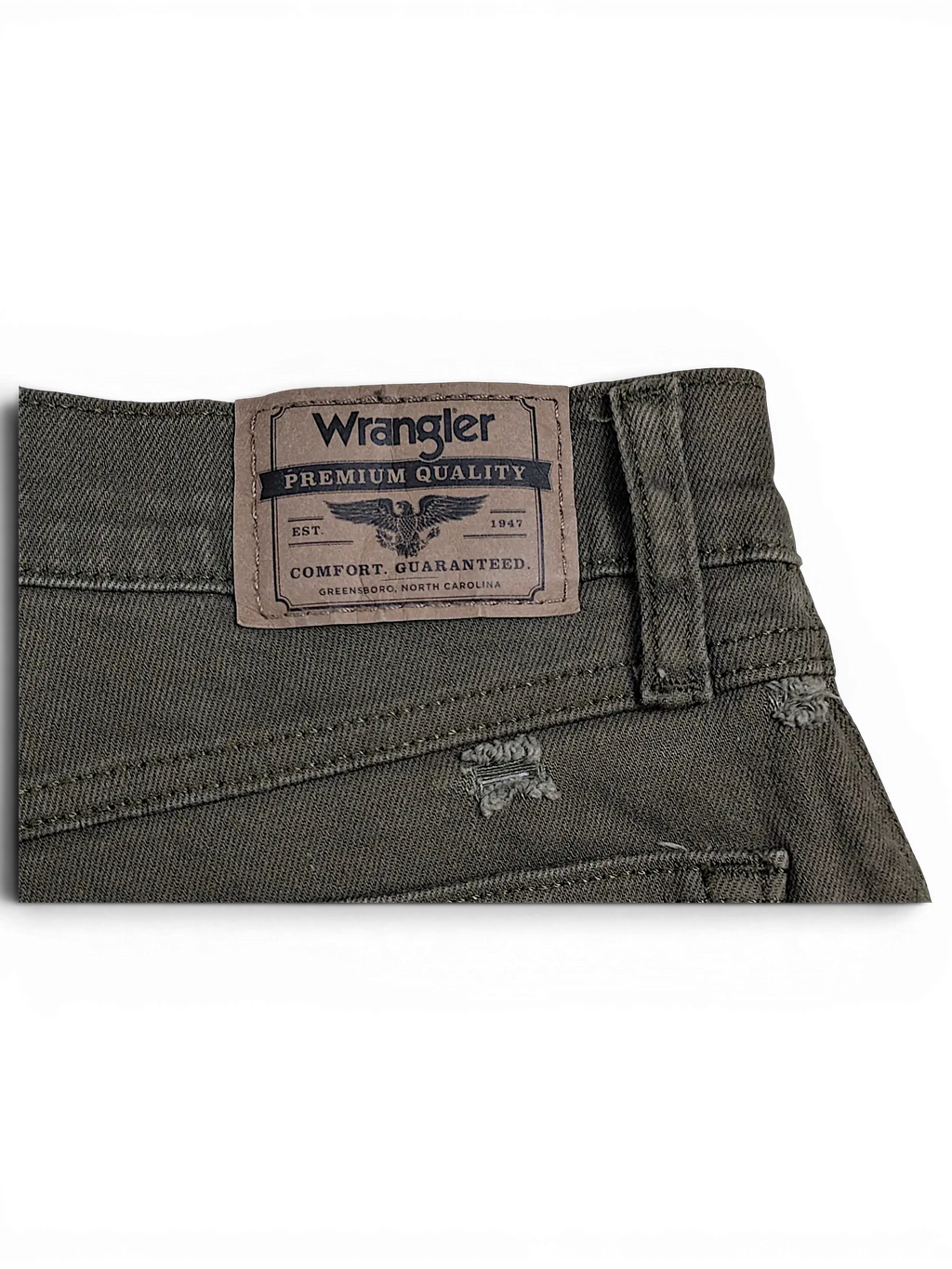 JAKE & IPI Wrangler green athletic fit jeans featuring a brown leather brand patch and distressed denim details.