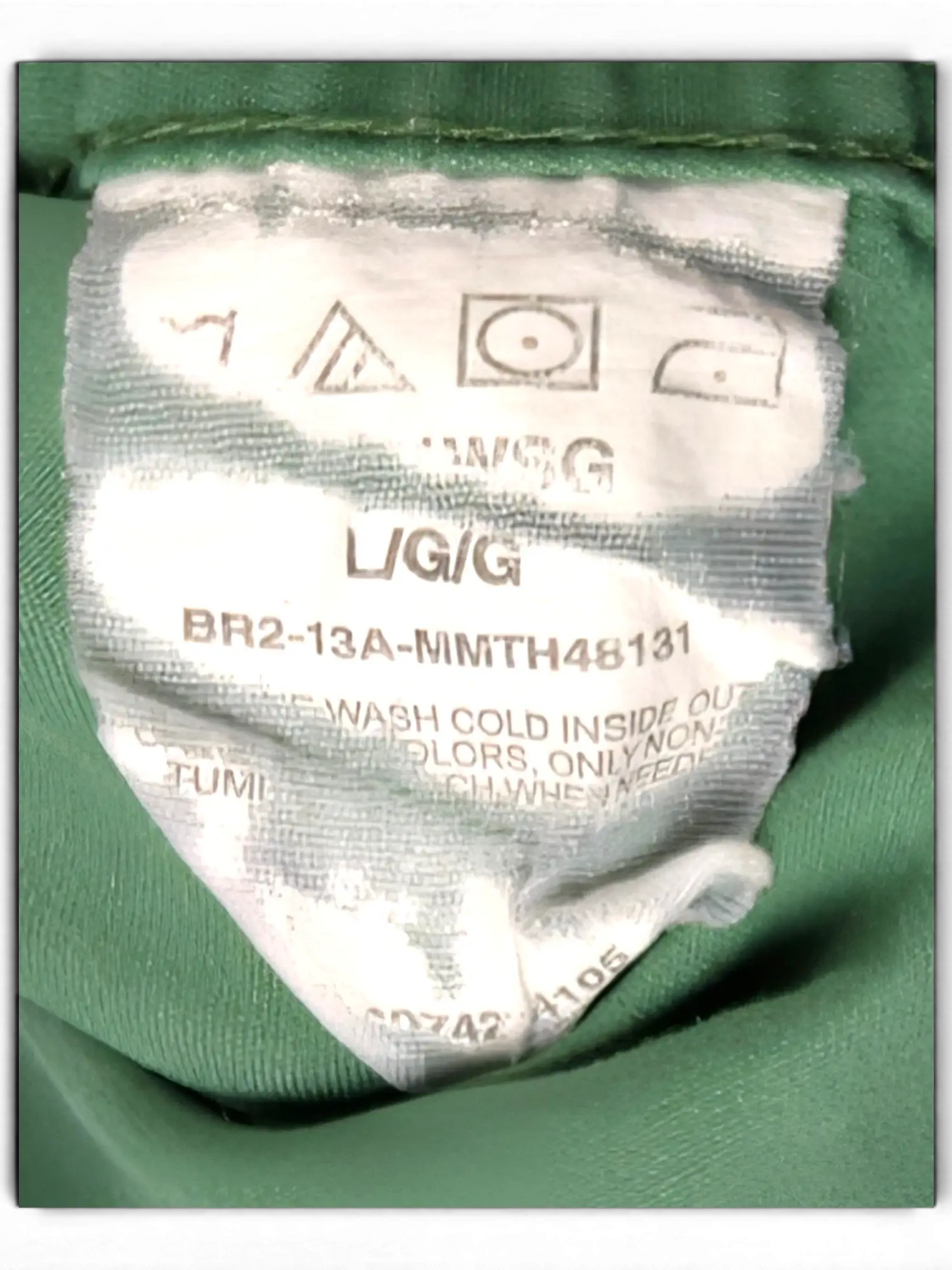JAKE & IPI Wrangler green utility shirt care label showing size large and washing instructions