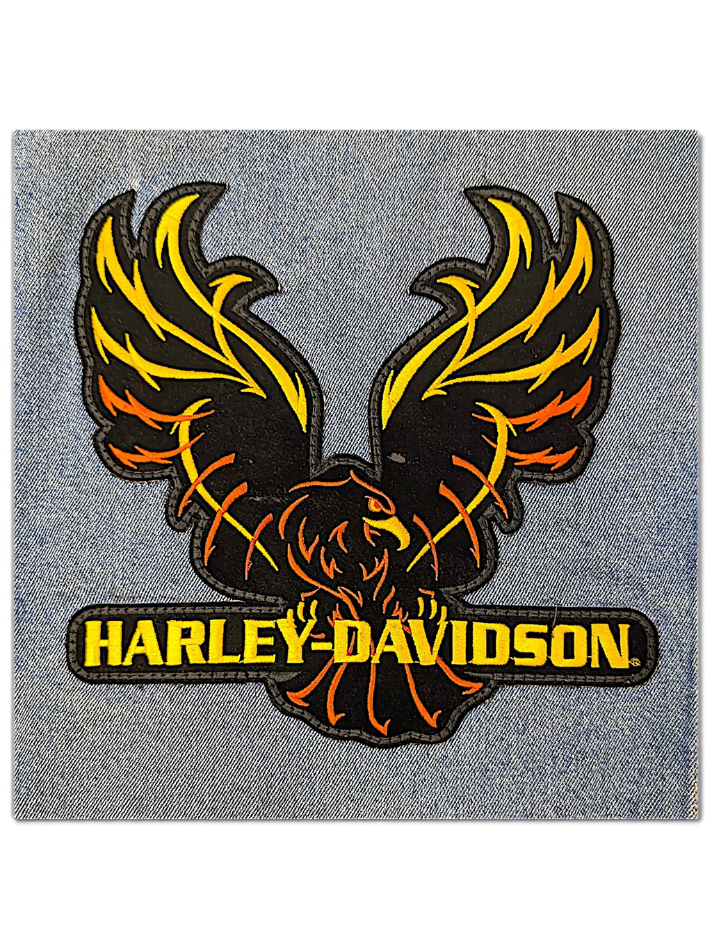 JAKE & IPI Wrangler denim jacket featuring a detailed orange and yellow embroidered Harley-Davidson eagle logo