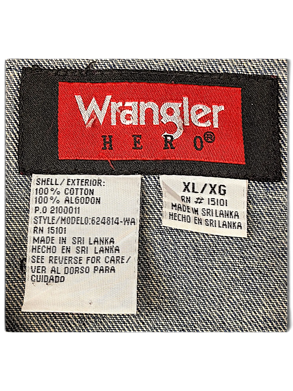 JAKE & IPI Wrangler Hero denim jacket interior label showing 100 percent cotton material and size XL