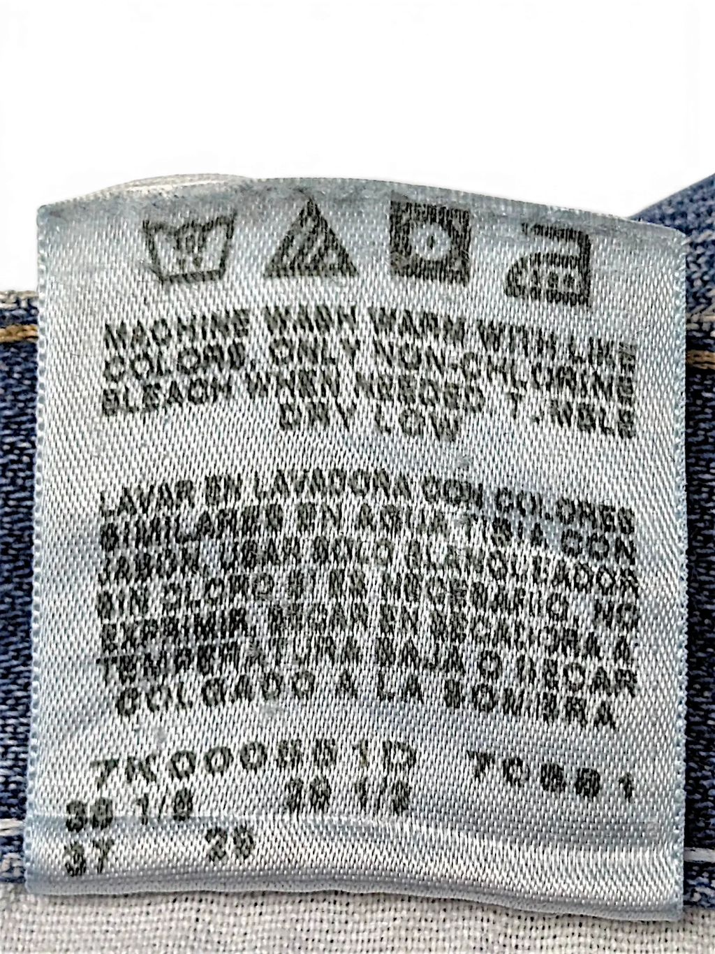 JAKE & IPI Wrangler 96501DS denim jeans care label with washing instructions and size details