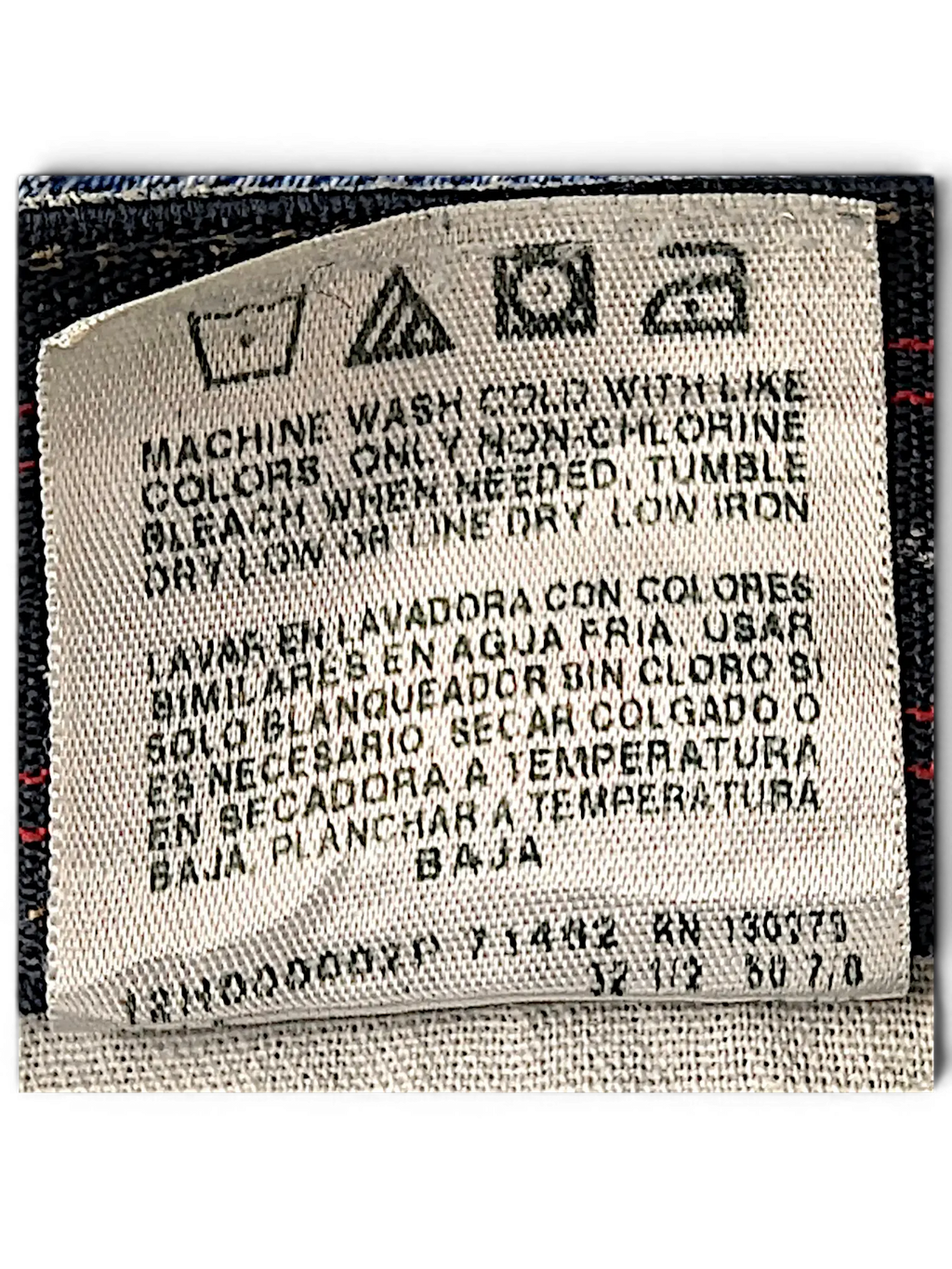 JAKE & IPI Wrangler regular fit jeans interior care label and blue denim fabric detail