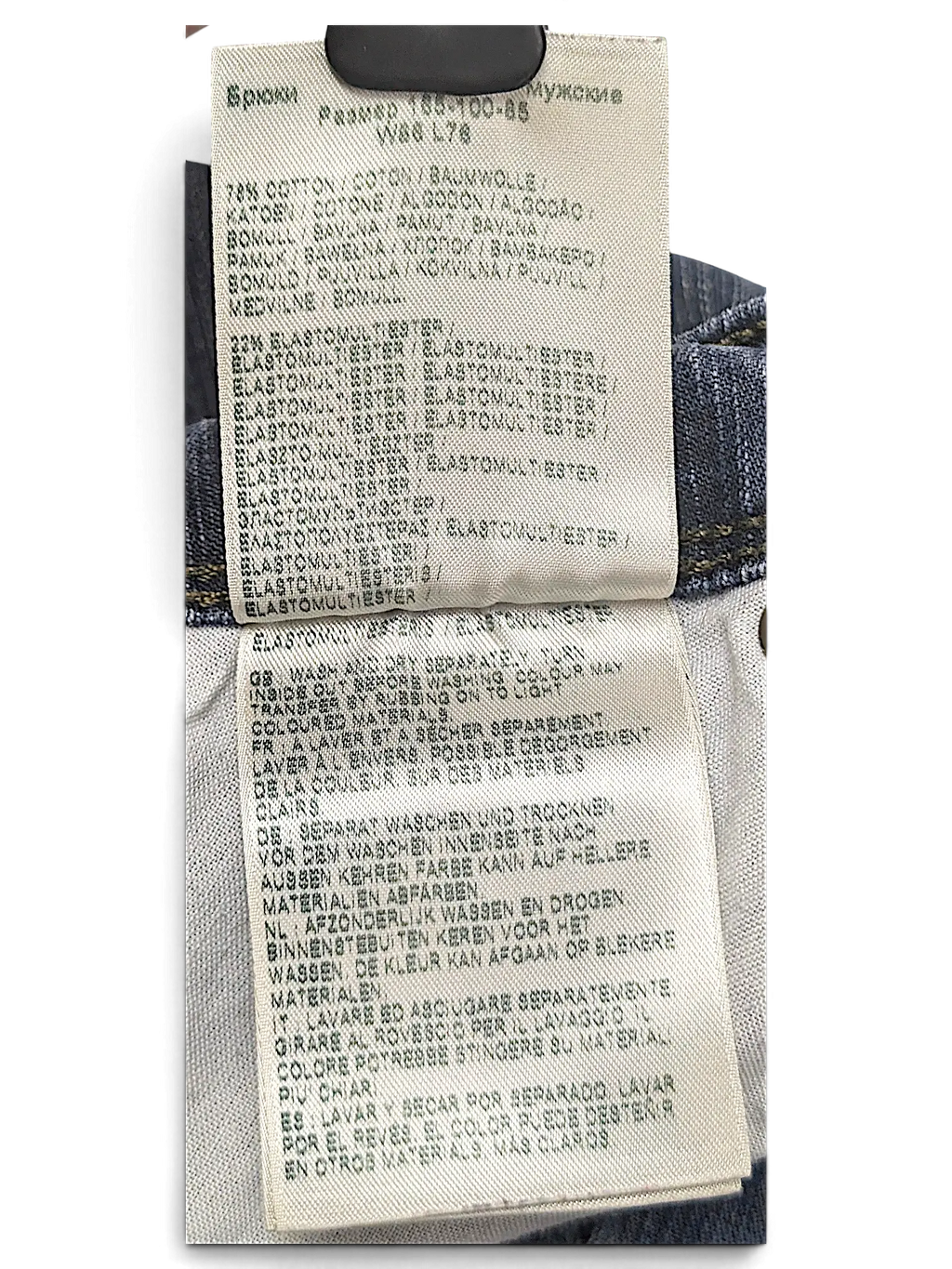 JAKE & IPI Wrangler jeans care label showing cotton and elastomultiester fabric composition and washing instructions